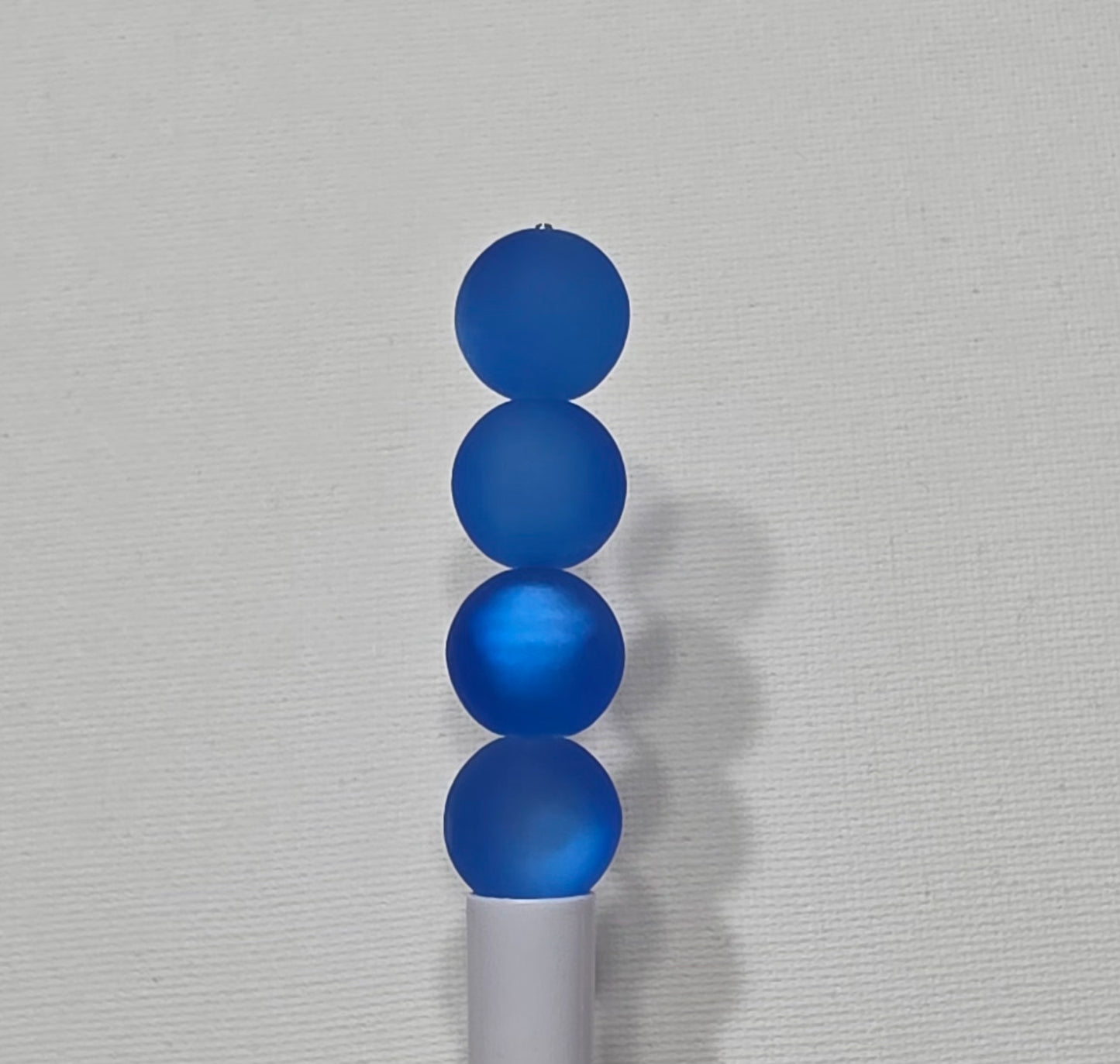 16mm frosted cat eye acrylic beads.
