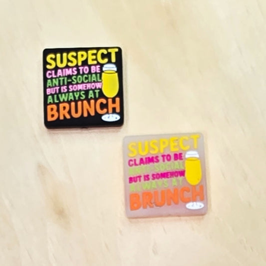 Suspect claims to be anti-social but somehow always at brunch silicone focal bead A582