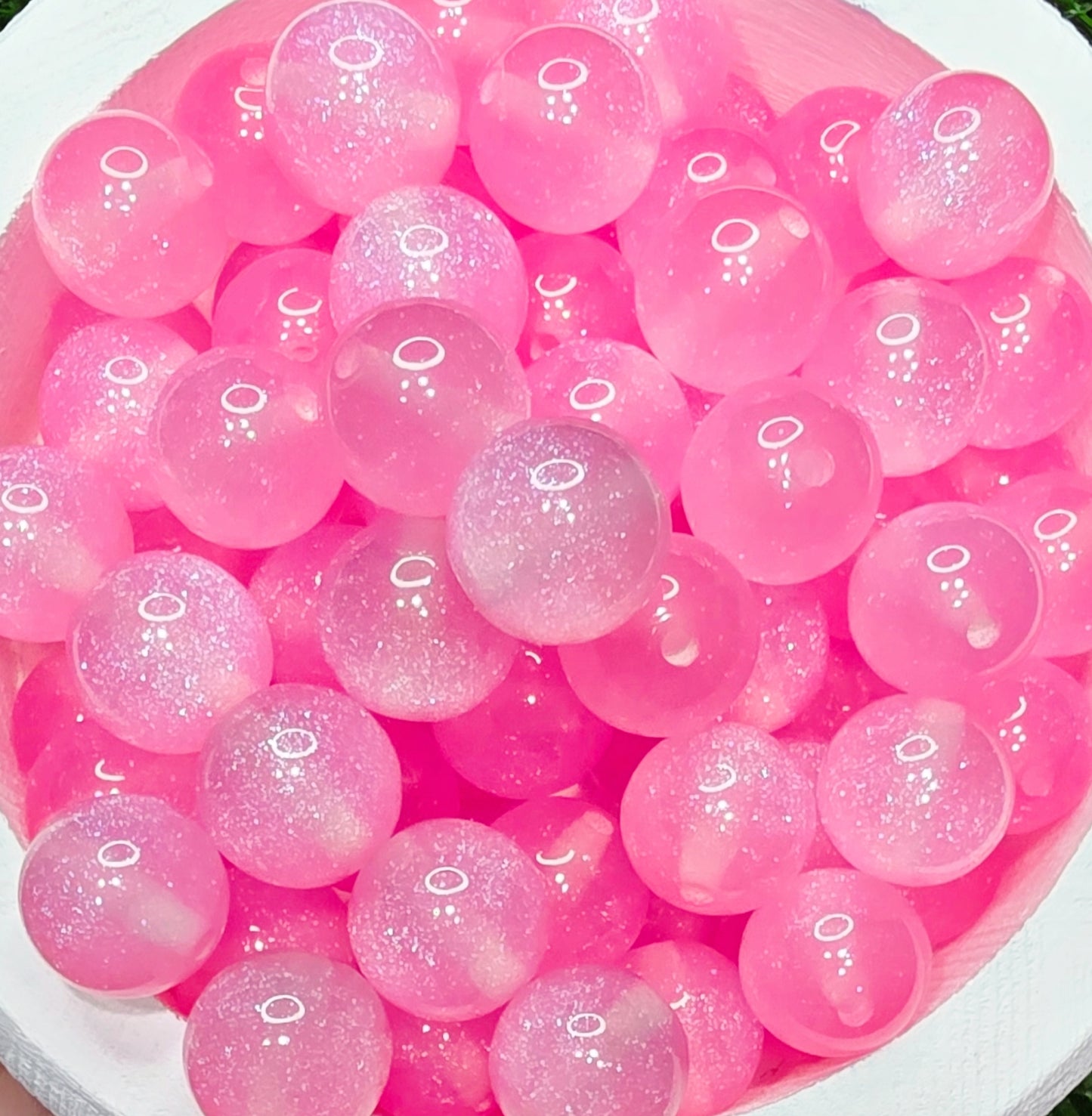 Pink 16mm glow in the dark glitter acrylic beads